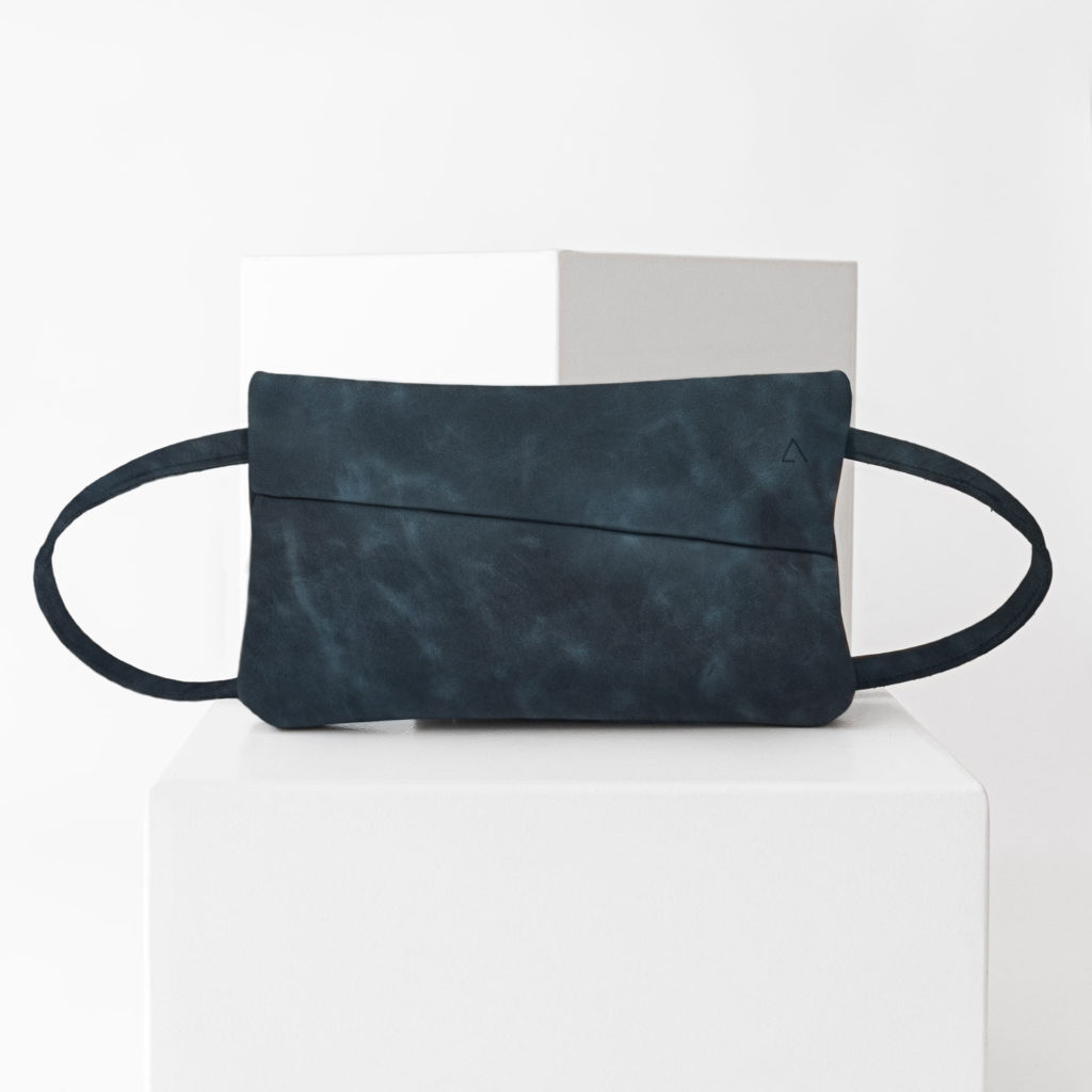 3-in-1 bag ISA made of sustainable natural leather in dark blue with discreet logo embossing and adjustable strap