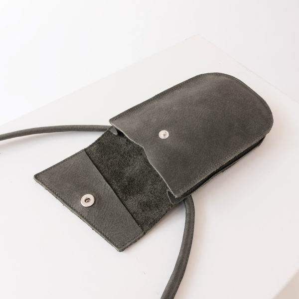 Cell phone case chest pouch IRA made of sustainable natural leather in stone gray unfolded with snap closure