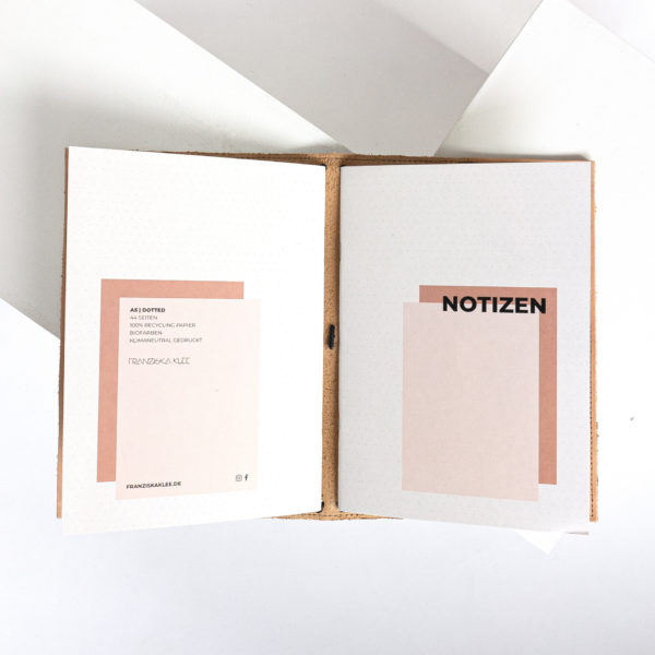 Notebook cover NOA A5 in cognac color with notebooks.