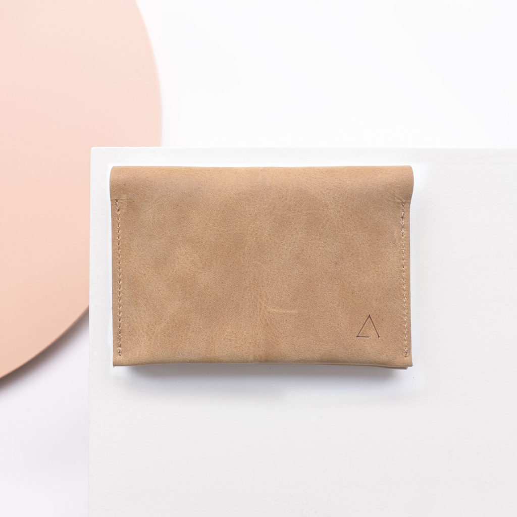 Wallet OLI LARGE made of sustainable natural leather in light brown from the front with logo embossing