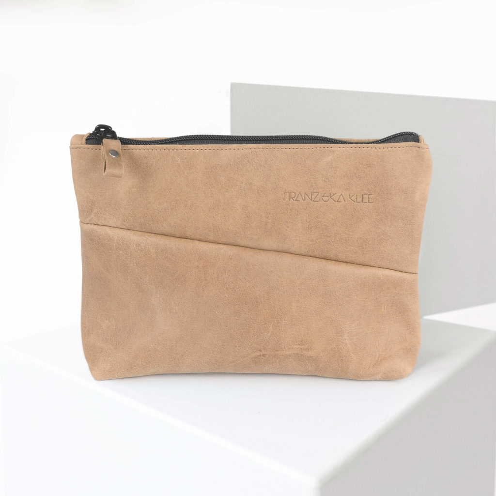 Cosmetic bag Pouch FRA made of sustainable natural leather in light brown with logo embossing from the front