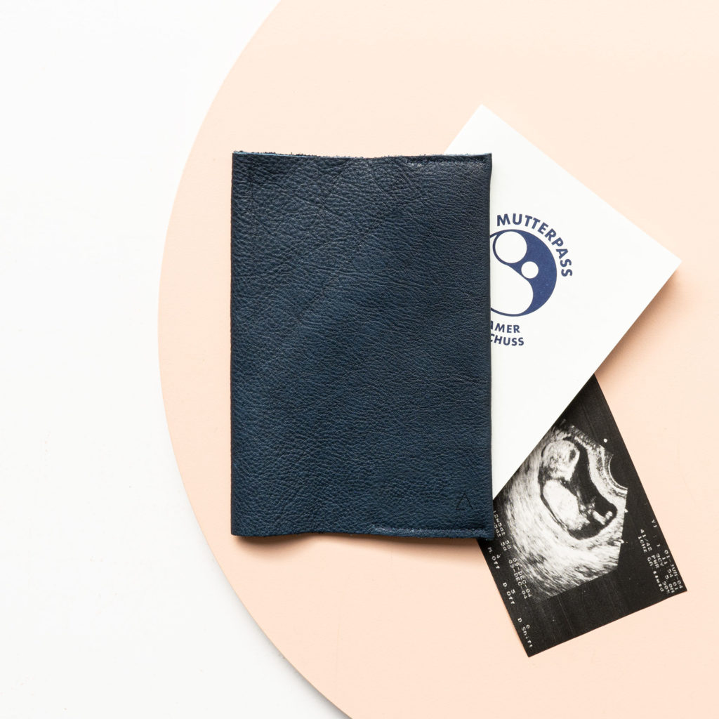 Mother passport cover EVE made of sustainable natural leather in dark blue with discreet logo embossing