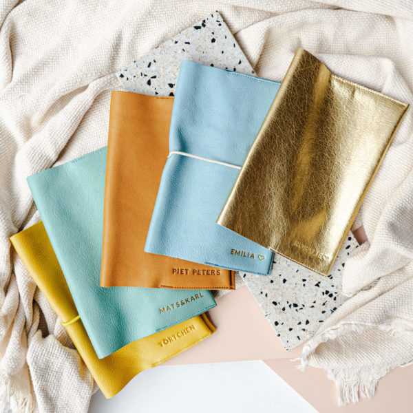 Mood Shot U-book cover EVE made of natural leather in yellow, mint, cognac, light blue and gold with individual embossing