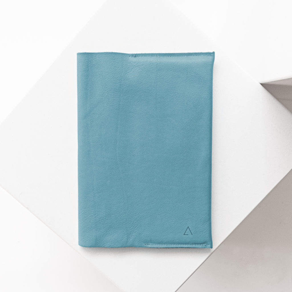 U-book cover EVE made of sustainable natural leather in light blue with discreet logo embossing
