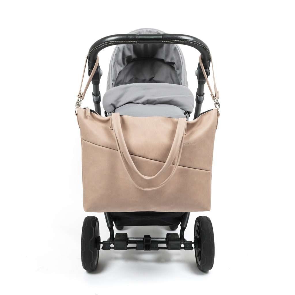 Diaper bag ELA natural leather in light brown with suspension attached to stroller